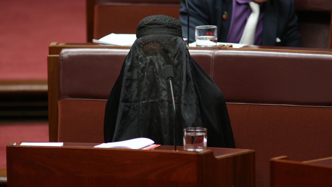 Senator Hanson in a black burqa in the Senate in Parliament House in Canberra. Picture: Gary Ramage