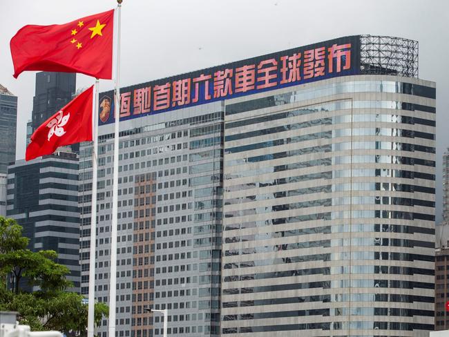 (FILES) In this file photo taken on August 6, 2021 China Evergrande Centre is seen in the Wan Chai district of Hong Kong. - Shares of embattled Chinese real estate giant Evergrande plunged on September 7, deepening an investor retreat with analysts cutting its credit and stock ratings again. (Photo by ISAAC LAWRENCE / AFP)