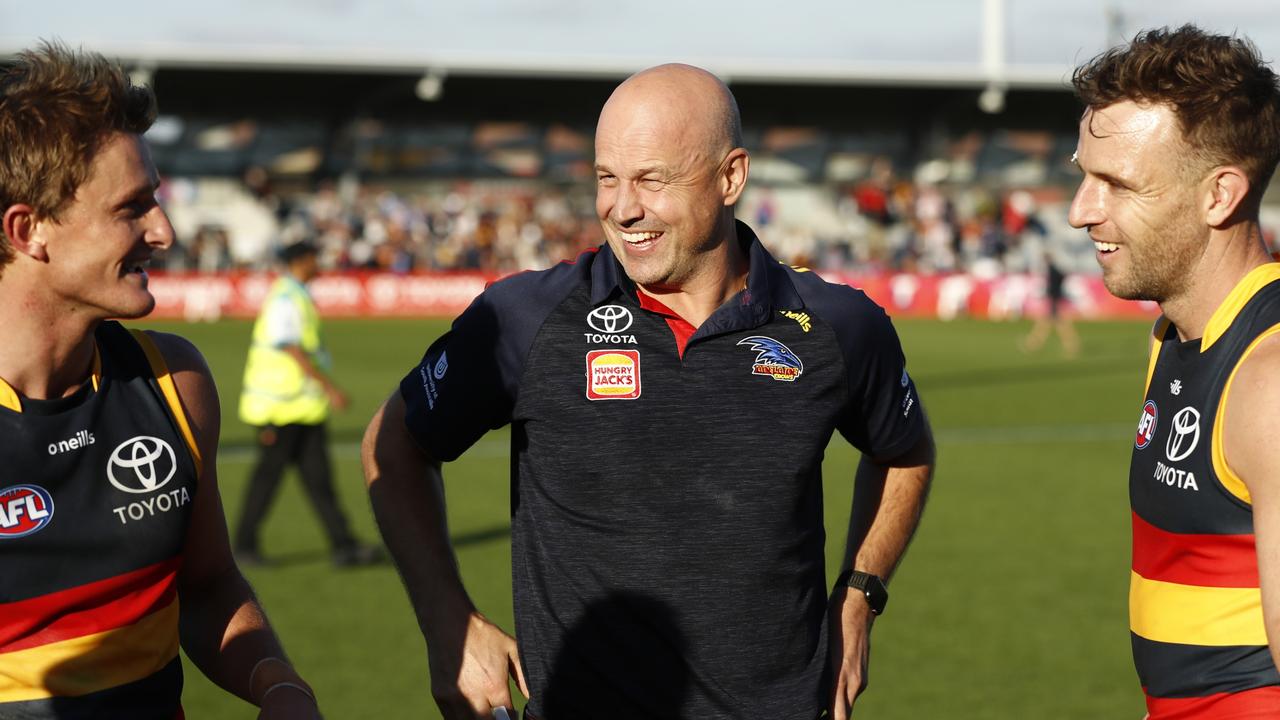 Matthew Nicks, with Matt Crouch and Brodie Smith, after the win over the Bulldogs. Picture: Darrian Traynor/Getty Images