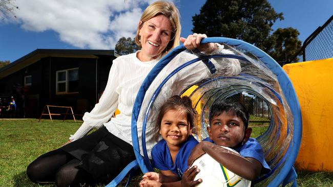 Principal Lee Musumeci with students Azarli and Suhanthan, both 3, at Challis Community school in Armadale. Picture: Colin Murty