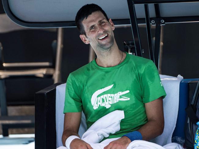 Novak Djokovic of Serbia takes part in a practice session ahead of the Australian Open tennis tournament in Melbourne on January 13, 2022. (Photo by Mike FREY / AFP) / -- IMAGE RESTRICTED TO EDITORIAL USE - STRICTLY NO COMMERCIAL USE --