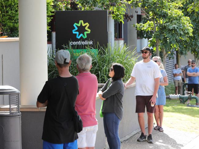 The queue outside Southport Centrelink at 8.40am this morning. Picture Glenn Hampson