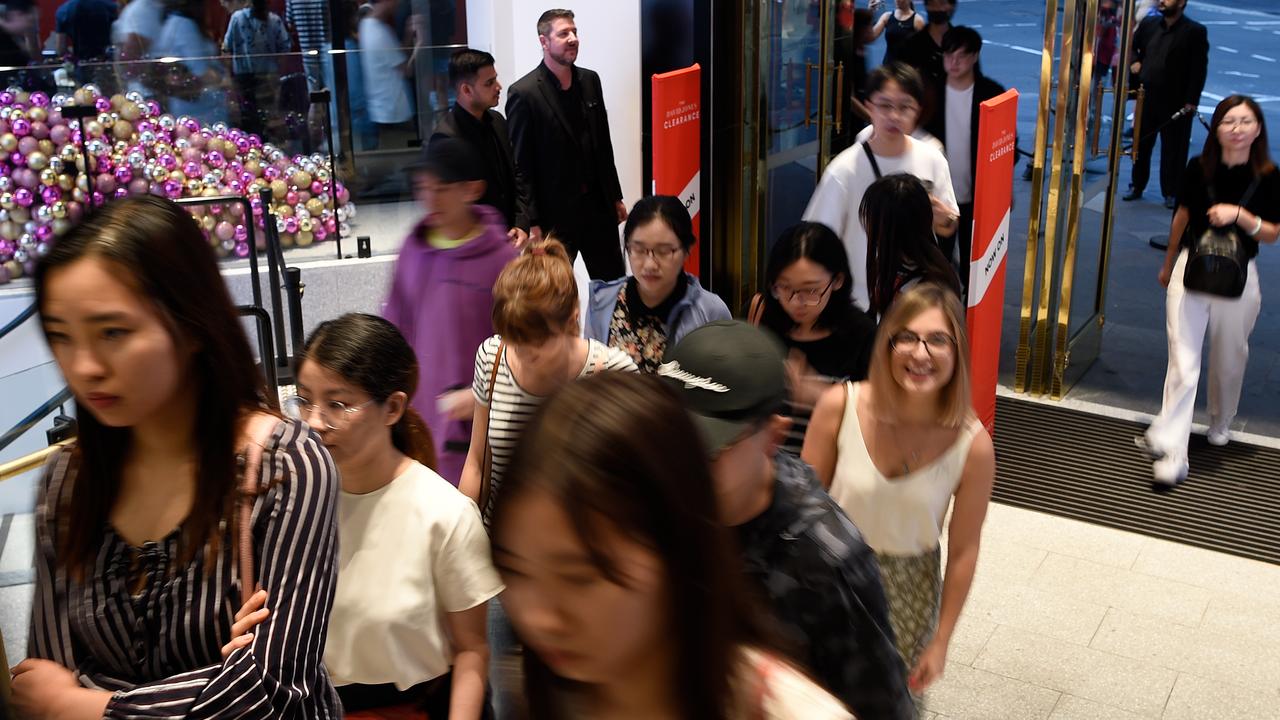 The first shoppers stream into David Jones in the Sydney CBD on Boxing Day 2019. Picture: Bianca De Marchi