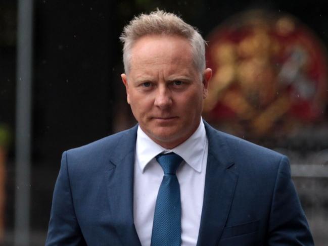 CEO and Senior Financial Advisor at Henderson Maxwell, Sam Henderson (right) arrives at the Federal Court in Melbourne, Tuesday, April 24, 2018. The financial services royal commission public hearing into financial advice continues in Melbourne. (AAP Image/Stefan Postles) NO ARCHIVING