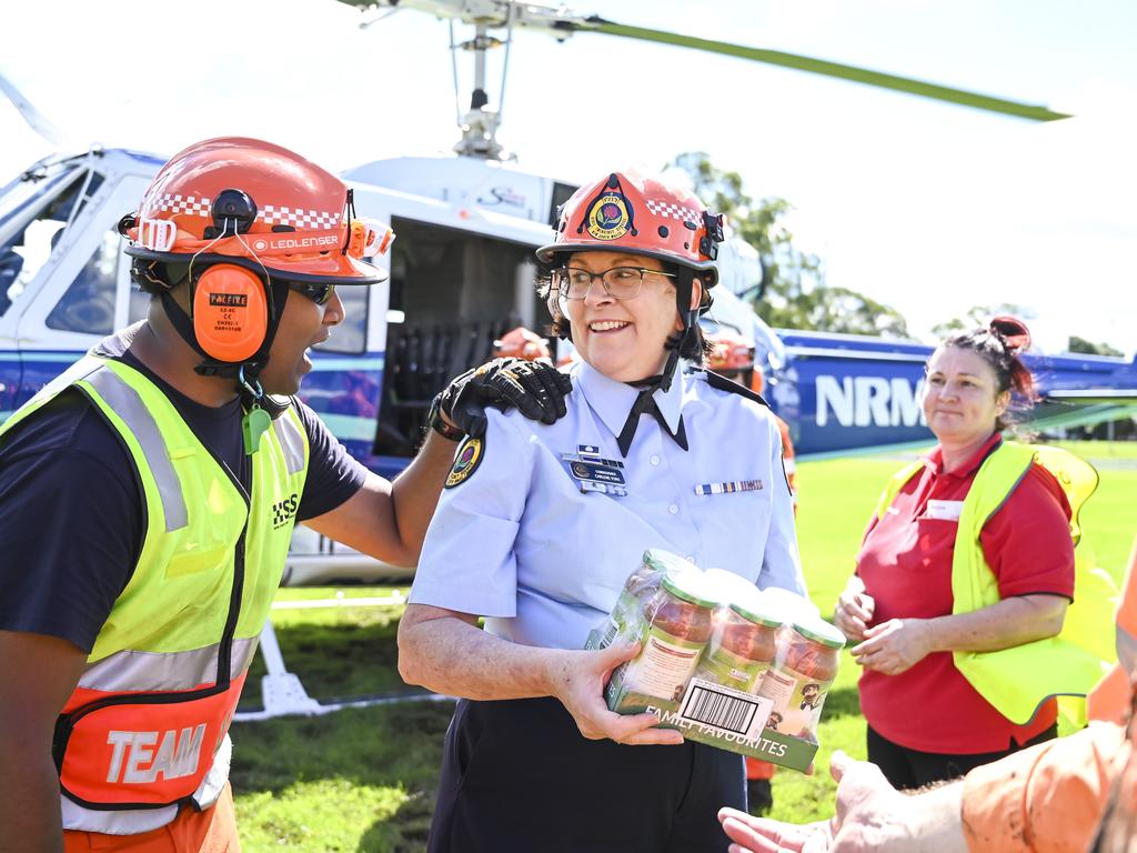 SES Commissioner Carlene York at McQuade Park Windsor, helping load food supplies into helicopters with volunteers and SES. Picture: Darren Leigh Roberts