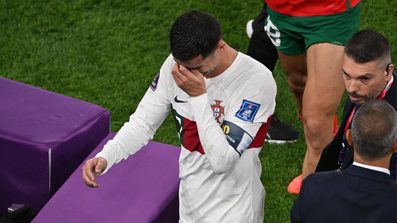 Portugal's forward #07 Cristiano Ronaldo leaves the field after losing to Morocco. (Photo by NELSON ALMEIDA / AFP)