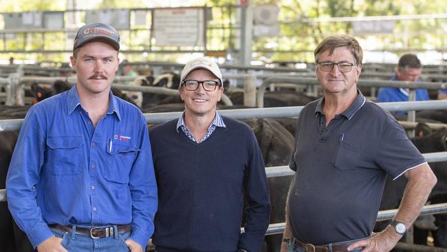 Brady Purcell from Corcoran Parker Wangaratta, Tony Symons farm owner from Thornton and Bernie Taylor farm manager at the Yea cattle sale. Picture: Zoe Phillips