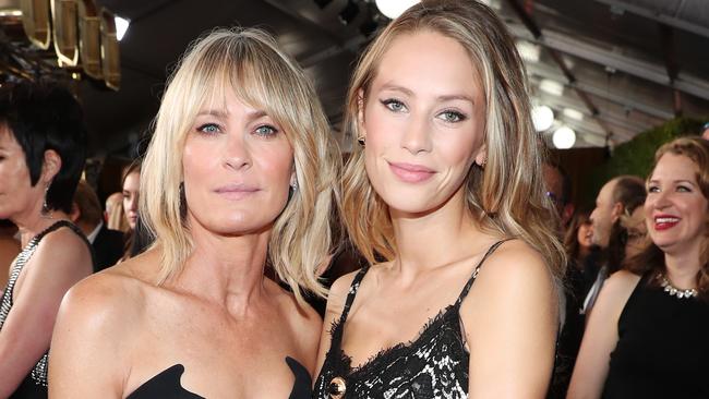 LOS ANGELES, CA - SEPTEMBER 17:  Actor Robin Wright (L) and Dylan Penn walk the red carpet during the 69th Annual Primetime Emmy Awards at Microsoft Theater on September 17, 2017 in Los Angeles, California.  (Photo by Rich Polk/Getty Images for IMDb)