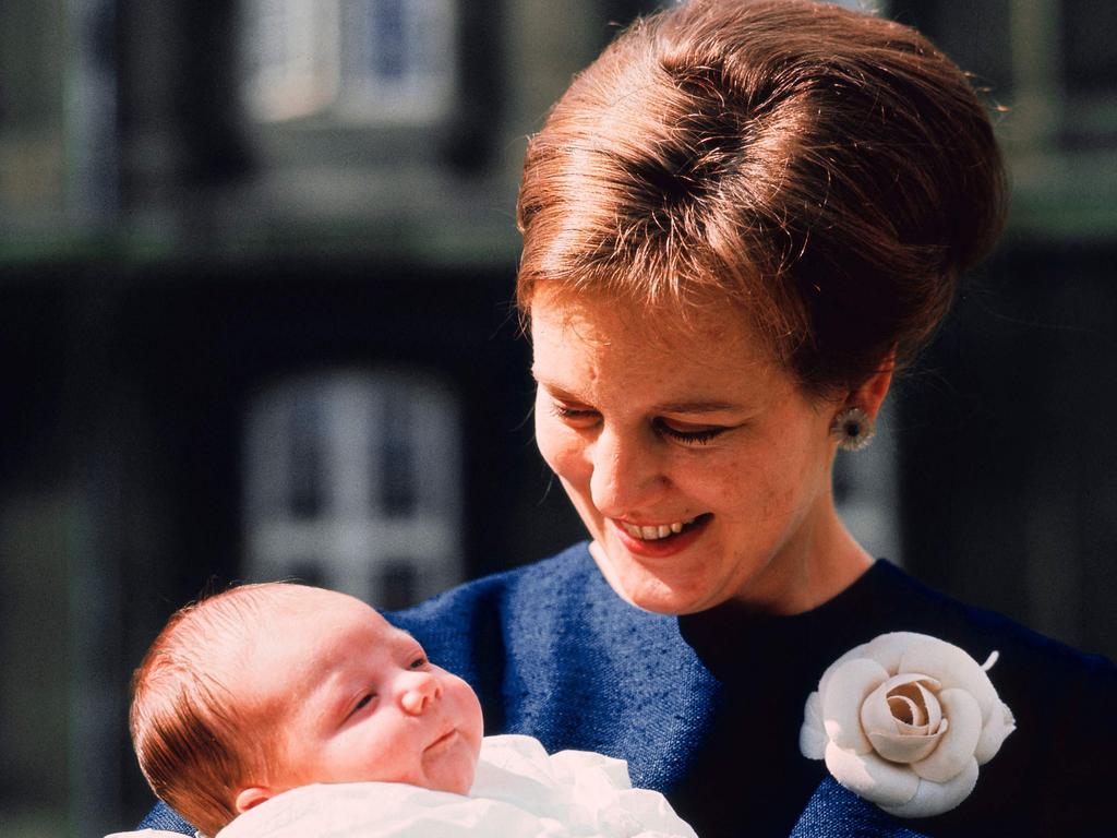 Queen Margrethe holds her baby son Frederik. Picture: AFP