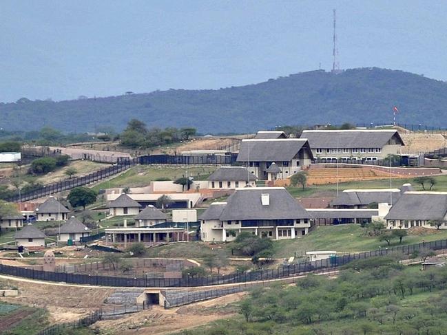 This photo taken Sept 28 2012 shows the private compound homestead of South African President Jacob Zuma in Nkandla, in the northern KwaZulu Natal province South Africa. Zuma is embroiled in a new scandal over costly additions to his private home at the taxpayers' expense. The revelations of the $23 million renovation of Zuma's rural compound, dubbed  Zumaville  in the local press, come before the ANC's December conference where Zuma seeks to be reappointed as the party's leader, and therefore its candidate for president in the 2014 national election. (AP Photo) SOUTH AFRICA OUT