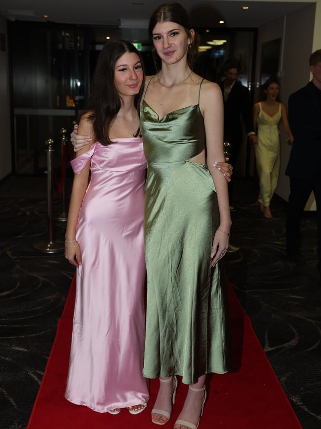 MELBOURNE, AUSTRALIA – JUNE 14 2024 Montanna Maher and Madison Maher attend the Lowanna College Senior Formal 2024 at the Moe Racing Club Picture: Brendan Beckett