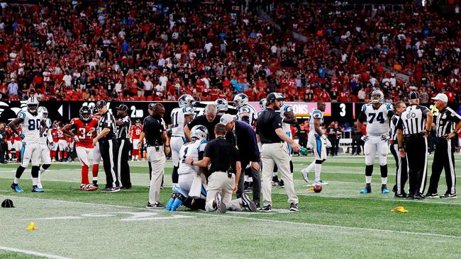 Flags are thrown after a late hit on Cam Newton #1 of the Carolina Panthers by Damontae Kazee #27 of the Atlanta Falcons. Picture: Getty Images