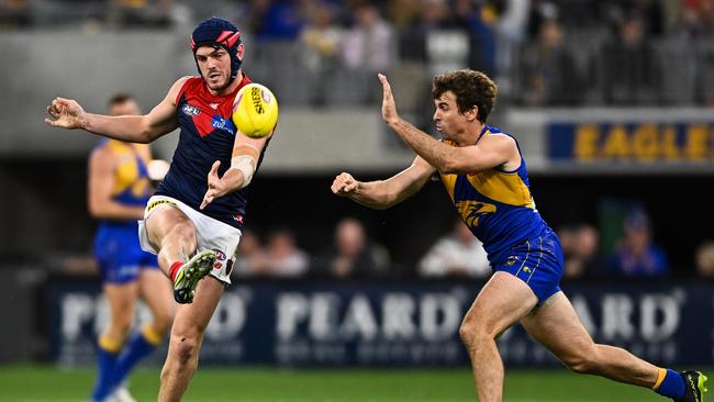 PERTH, AUSTRALIA - MAY 15: Angus Brayshaw of the Demons kicks the ball during the 2022 AFL Round 09 match between the West Coast Eagles and the Melbourne Demons at Optus Stadium on May 15, 2022 in Perth, Australia. (Photo by Daniel Carson/AFL Photos via Getty Images)