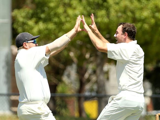 Michael Splatt (right) of Oakleigh celebrates the wicket of Robert Templeton of Malvern from the first ball of the match during VSDCA: Oakleigh v Malvern on Saturday, February 2, 2019, in Oakleigh, Victoria, Australia. Picture: Hamish Blair