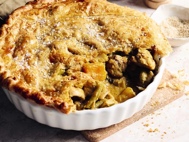 EMBARGO FOR TWAM 15 JUNE 2024. FEE MAY APPLY. Chicken Korma Curry Pie - Wholesome by Sarah by Sarah Pound, published by Plum, RRP $44.99, photography by Mark Roper