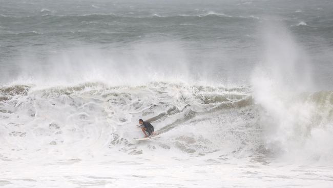 Surfers pictured at Main Beach in Byron Bay. Picture: Rohan Kelly