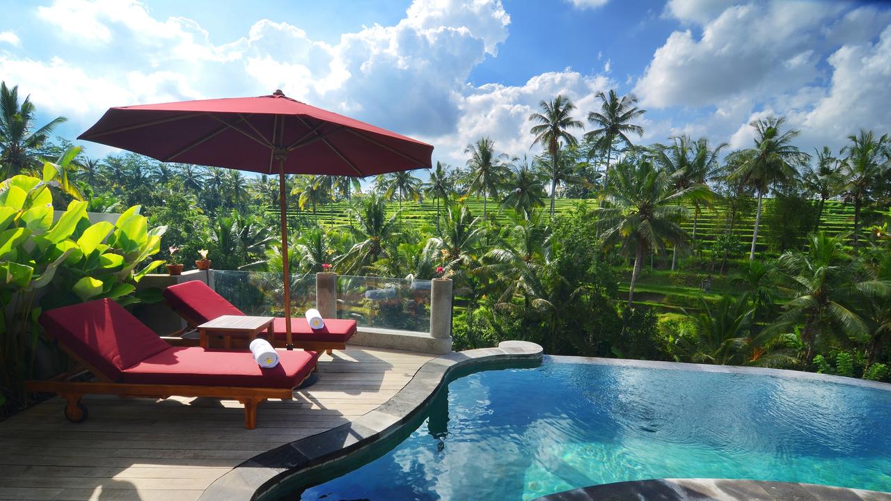 Pool deck with a view at Puri Sebali Resort  Spa, Bali.