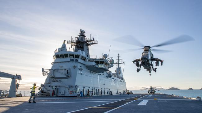 An Australian Army Tiger Armed Reconnaissance Helicopter conducts a deck landing on HMAS Canberra, during Exercise Sea Explorer.