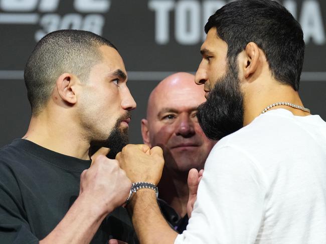 ABU DHABI, UNITED ARAB EMIRATES - OCTOBER 24: (L-R) Opponents Robert Whittaker of New Zealand and Khamzat Chimaev of Russia face off during the UFC 308 press conference at Etihad Arena on October 24, 2024 in Abu Dhabi, United Arab Emirates.  (Photo by Chris Unger/Zuffa LLC)