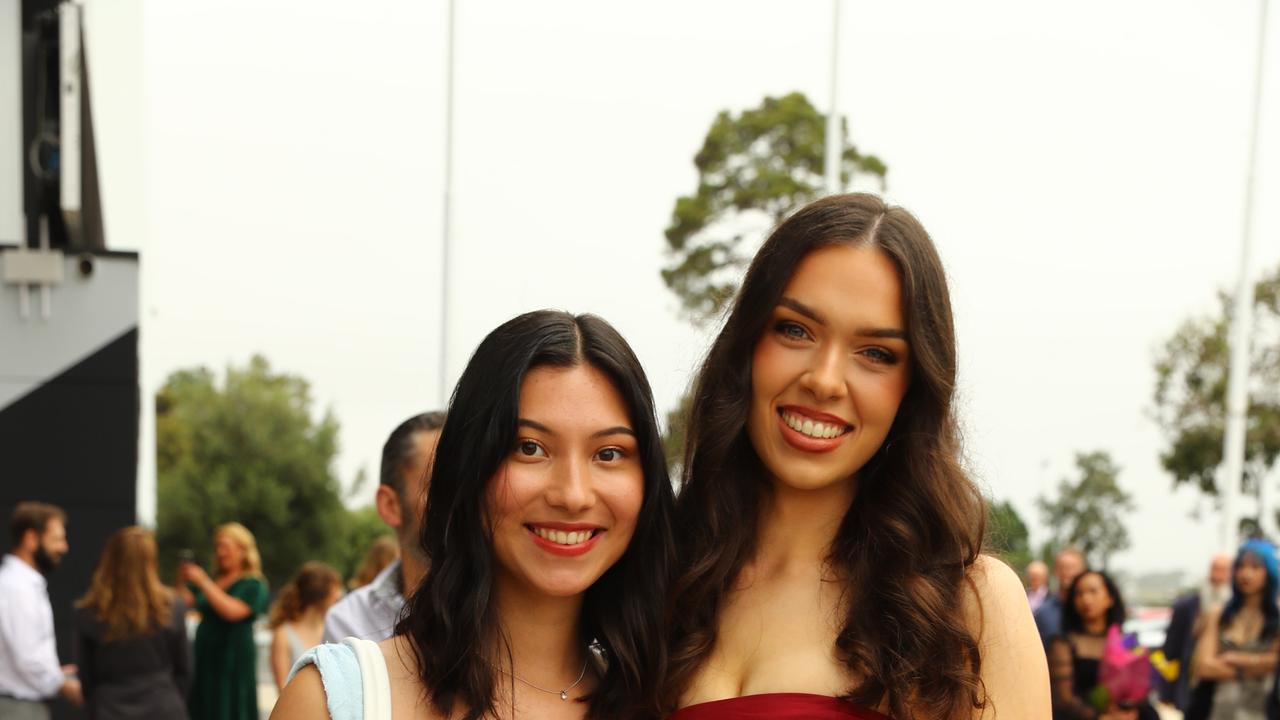 Madelyn Wills and Ava Masljak at the Belmont High School year 12 graduation at GMHBA Stadium. Picture: Alison Wynd