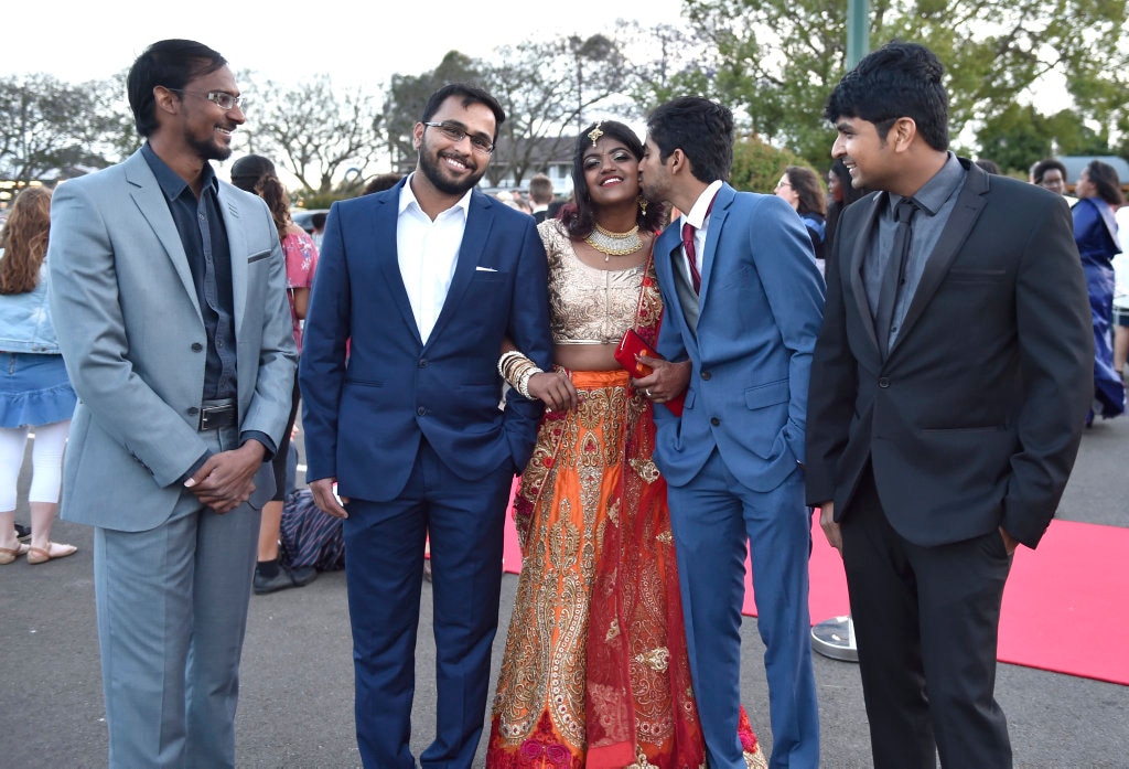 Naina Sadanala surrounded by her family. St Saviour's College formal, Toowoomba Turf Club. November 2017. Picture: Bev Lacey