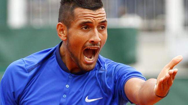 Nick Kyrgios yells at a ball boy during his first round match at the French Open.