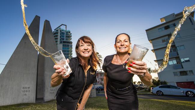 Twin Towns Services Club staff Annie Collinson and Lina Putzolu are toasting the reopening of the Queensland border. Picture: NIGEL HALLETT