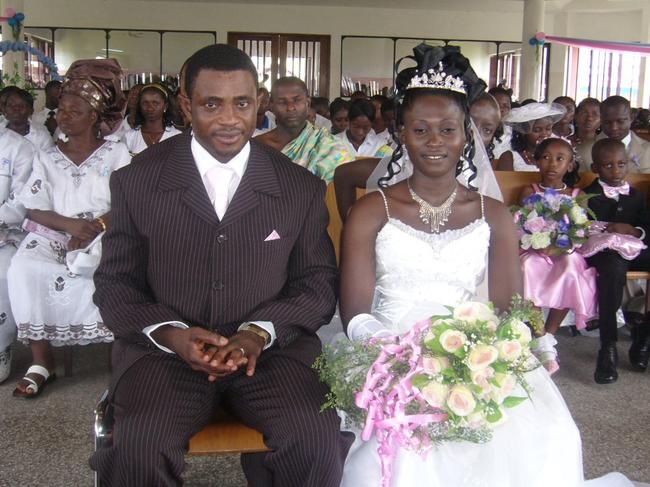 John Kamara with his wife, Mavis, at their wedding in Ghana in 2008. Picture: Supplied