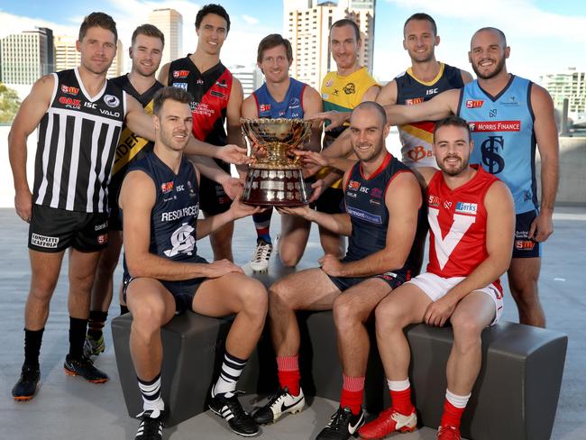 SANFL season launch at Adelaide Oval. The ten captains including Damon Hill, (Adelaide), Trent Goodrem (Centrals), Andrew Bradley (Glenelg), Max Thring (North Adelaide), Jace Bode (Norwood FC), Steven Summerton (Port Adelaide), Keegan Brooksby, (South Adelaide), Zane Kirkwood (Sturt), Tom Keough (West Adelaide), and Patrick Giuffreda (Eagles). 27 March 2018. (AAP Image/Dean Martin)