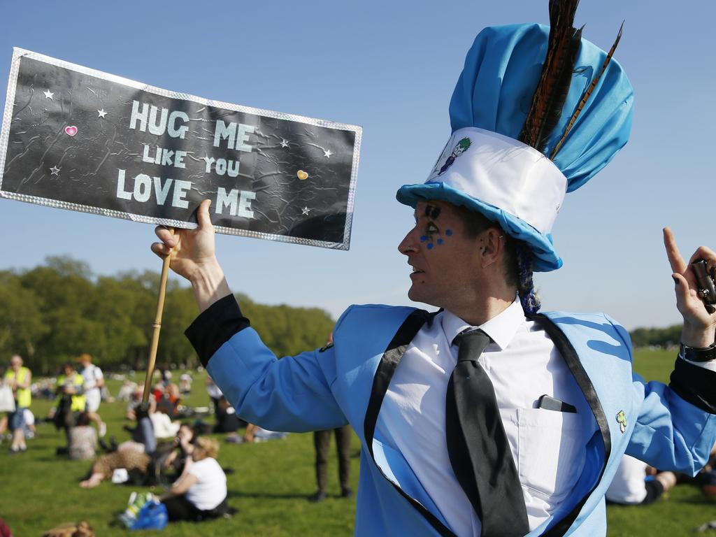 A demonstrator poses after a 