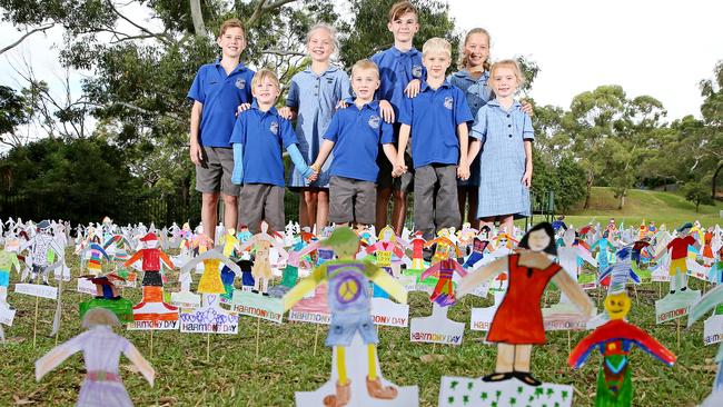 acques McFarland, Ralph Irger, Riley Menard, Ryker Archer, Will Taylor, Charlie Blackwood, Maddie Cowdry and Lacey Usher, with their Harmony Day figurines. Picture: Troy Snook