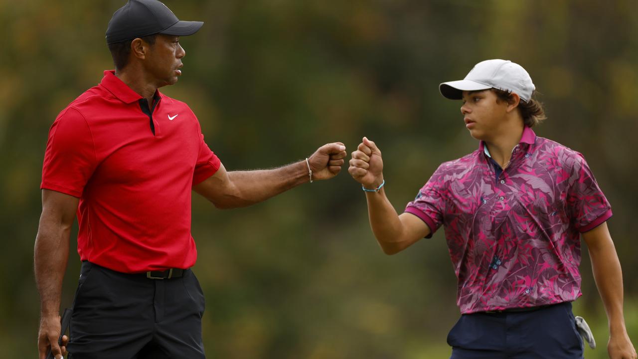 Tiger Woods and son, Charlie Woods. Photo by Mike Ehrmann/Getty Images.