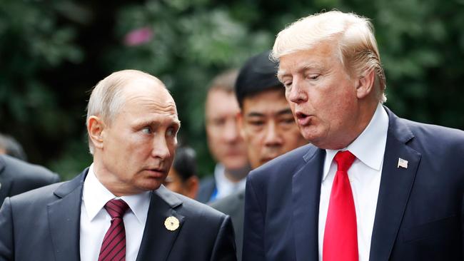 US President Donald Trump (right) and Russia's President Vladimir Putin talkduring the Asia-Pacific Economic Cooperation (APEC) leaders' summit in the central Vietnamese city of Danang in November last year. Photo: AFP