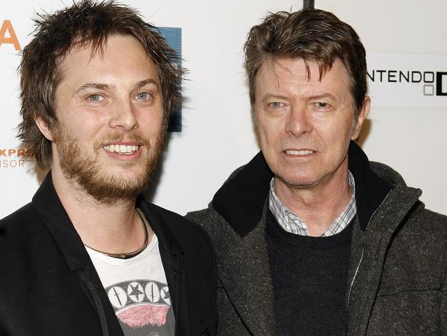 Director Duncan Jones, left, and his father in 2009.