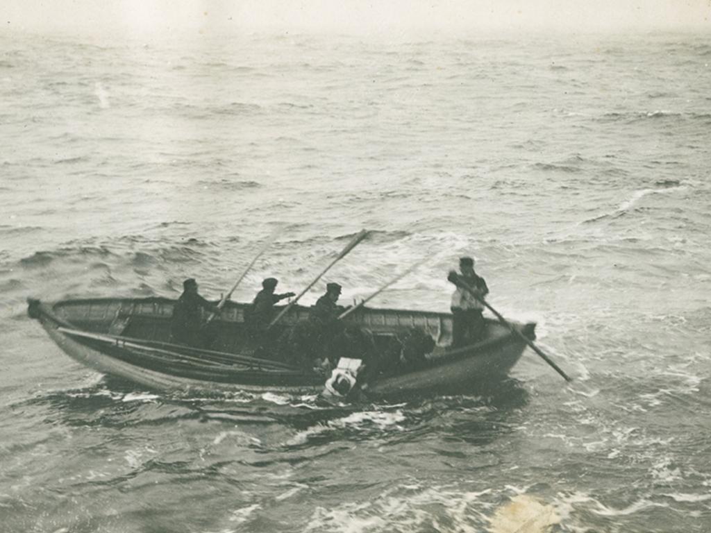 The body of an RMS Titanic victim being picked up at sea by unidentified ship's whaler from CS Minia. Picture: Nova Scotia Archives