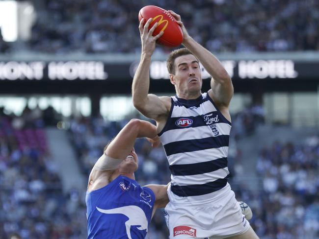 GEELONG, AUSTRALIA – APRIL 14: Jeremy Cameron of the Cats marks the ball during the round five AFL match between Geelong Cats and North Melbourne Kangaroos at GMHBA Stadium, on April 14, 2024, in Geelong, Australia. (Photo by Darrian Traynor/Getty Images)