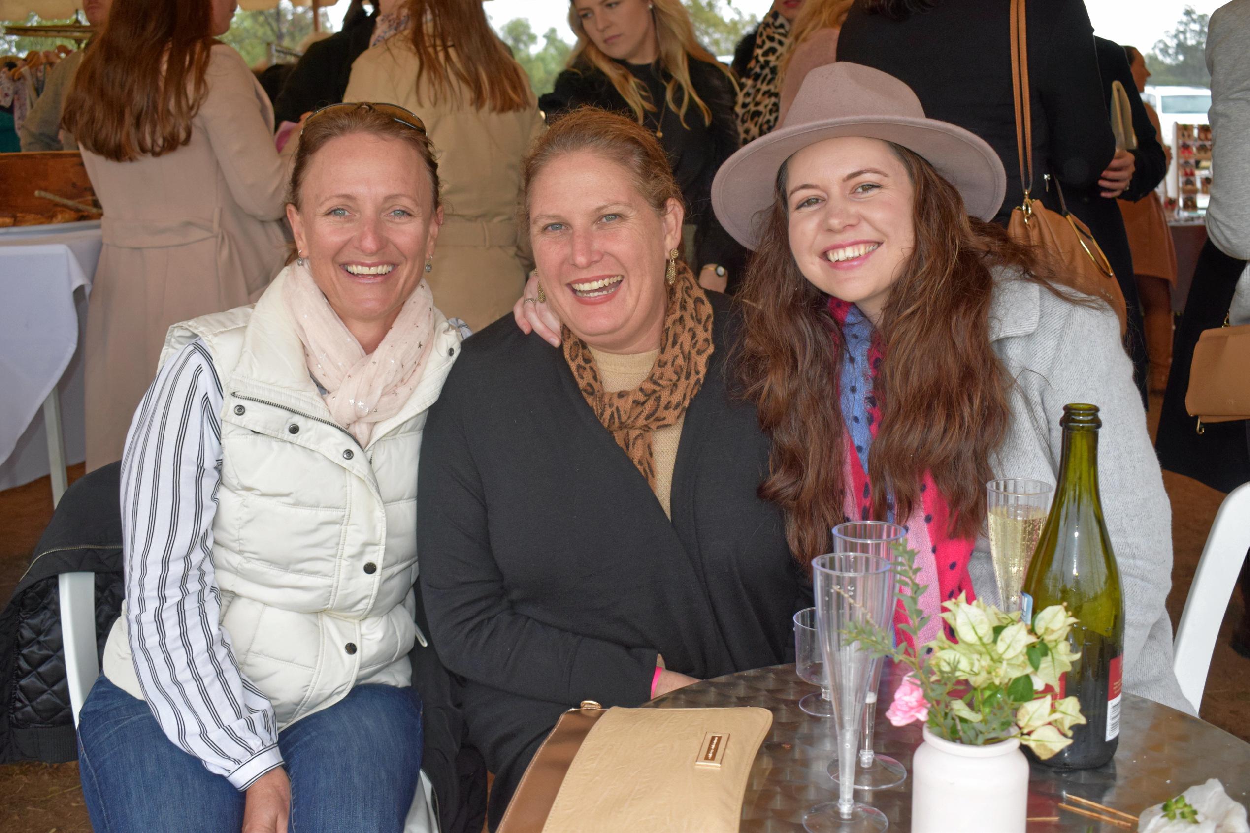 Rowie Gurner, Suzanne Blair, and Jessica Tully at the Condamine Cods Annual Ladies Day, June 8. Picture: Brooke Duncan