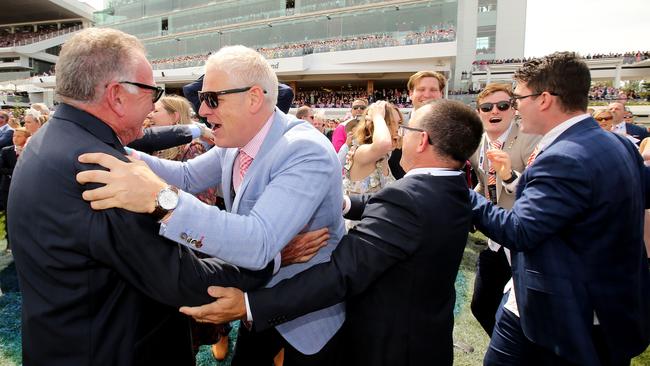 The winning connections celebrate after the Danny O'Brien trained Vow and Declare ridden by Craig Williams, wins the Melbourne Cup. Picture: Stuart McEvoy