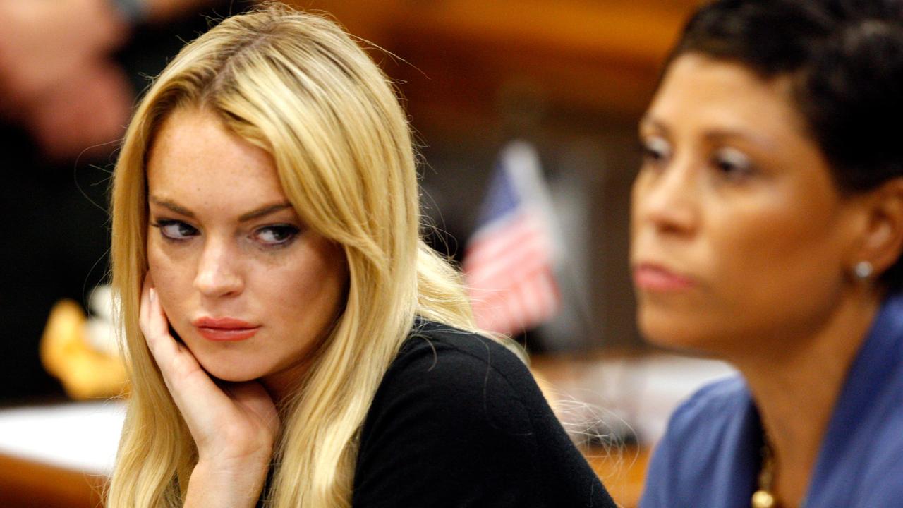 Lindsay Lohan in court in 2010 after being charged with violating her probation when her alcohol detection device went off at a MTV Movie Awards after-party. Picture: AP