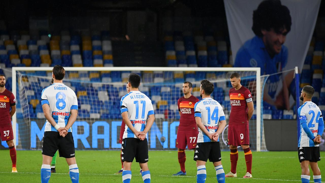 Players observe a minutes silence for former footballer, Diego Maradona. (Photo by Francesco Pecoraro/Getty Images)