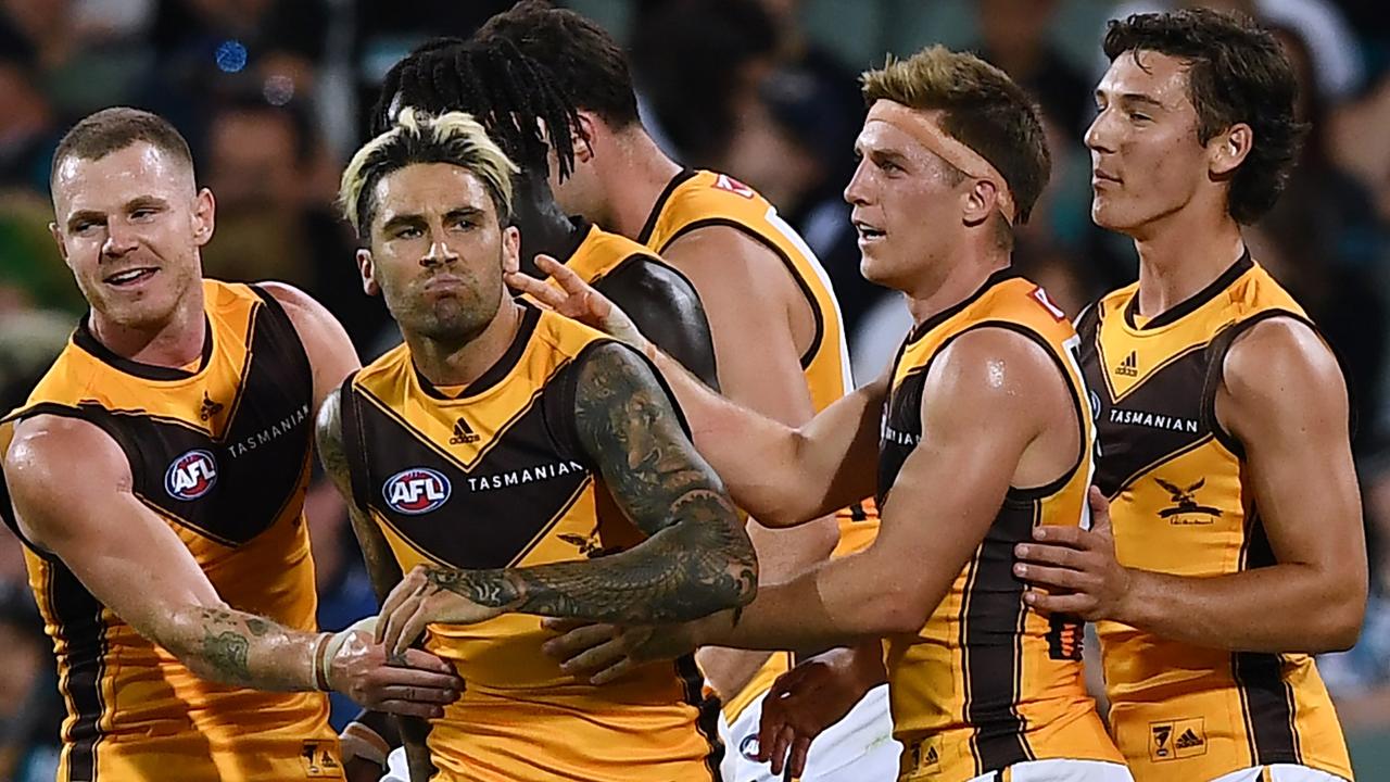 The Hawks get around Wingard during a March match. Picture: Getty Images