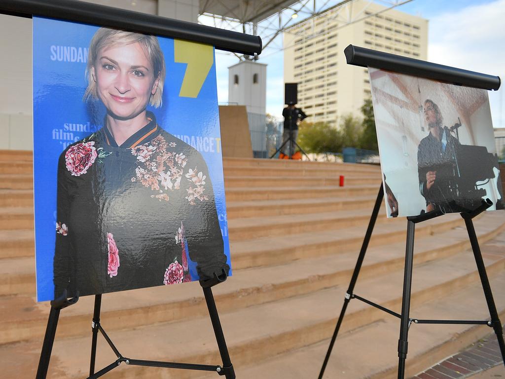 Photos of cinematographer Halyna Hutchins are displayed before a vigil held to honor her at Albuquerque Civic Plaza in Albuquerque, New Mexico. Picture: Getty Images