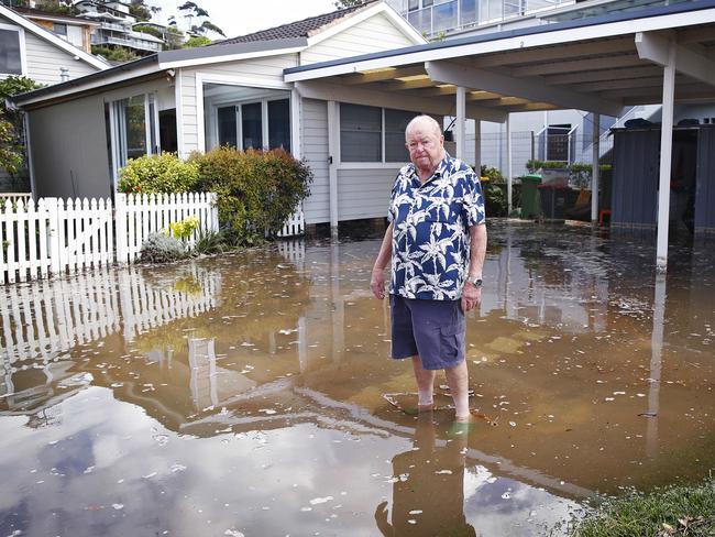 David Targett in his flooded front yard at Terrigal Beach. Picture: Sam Ruttyn