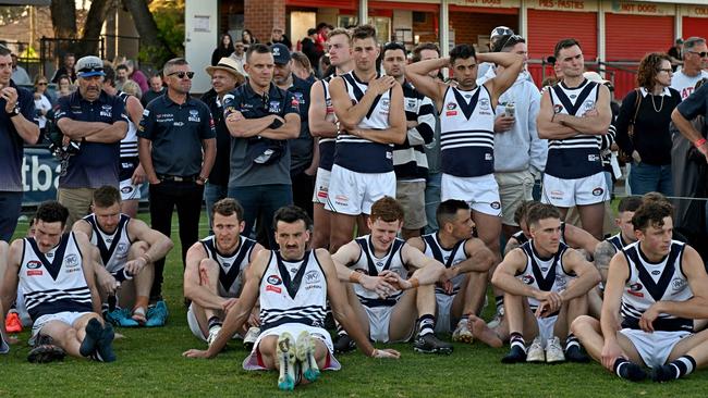 Disappointed Bundoora players after the grand final. Picture: Andy Brownbill