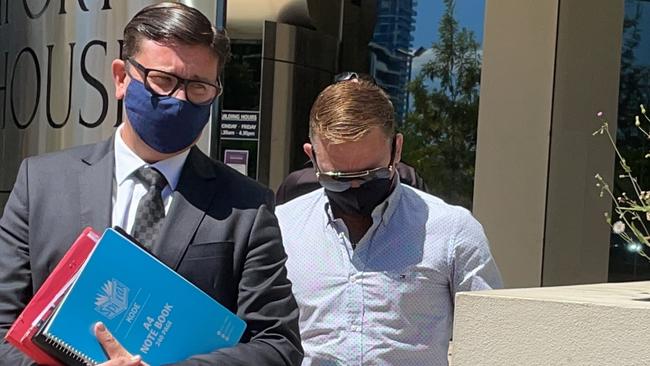 Mitchell Anthony Ralston (right) leaves Southport Court with his lawyer Michael Gatenby, of Gatenby Criminal Lawyers. Picture: Lea Emery