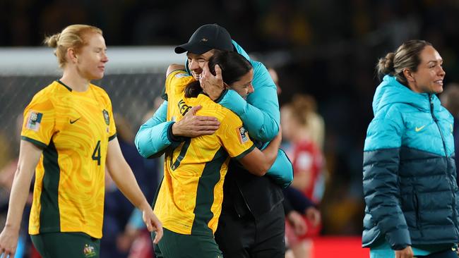 Tony Gustavsson embraces Sam Kerr during the World Cup. (Photo by Cameron Spencer/Getty Images)