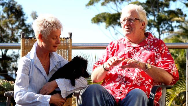 Darrell Eastlake with his wife Julie and dog Please, at his Terrigal home in 2010.