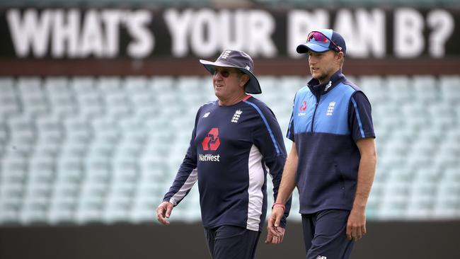 England's Joe Root, right, talks with head coach Trevor Bayliss during training for their Ashes cricket test match against Australia in Sydney, Wednesday, Jan. 3, 2018. The test begins on Thursday. (AP Photo/Rick Rycroft)