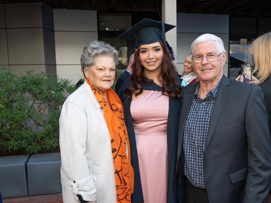 Emily Coote with Marlene and Richard Lade. Picture: Brad Fleet