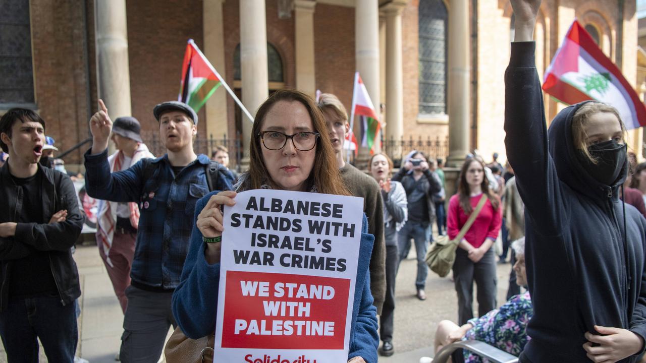 Dozens of people rallied outside the court hearing, upset with politicians for calling for the weekend rallies to not go ahead. Picture: NewsWire / Simon Bullard